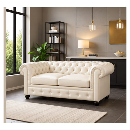 Cream Chesterfield style sofa with button tufting and rolled arms in a contemporary living room