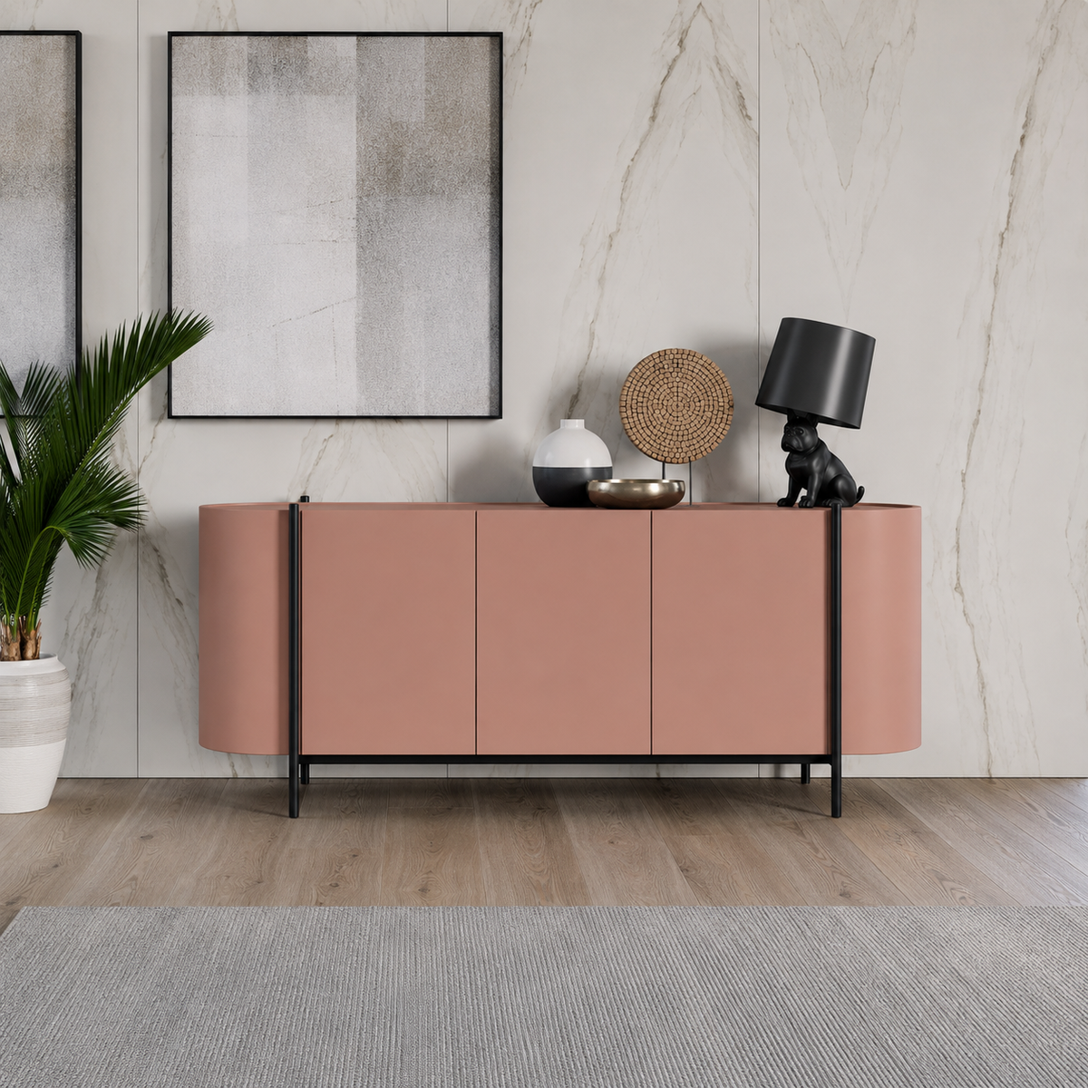 Dall'Agnese Supernova modern dusty pink wooden sideboard with black metal legs, styled in a minimalist room with a marble wall, framed art, a potted plant, and decorative objects on top.