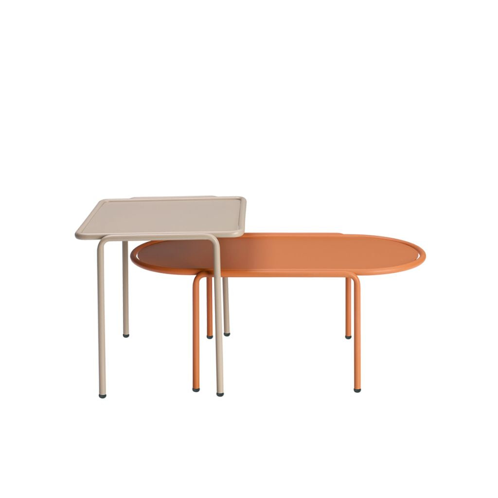 S•CAB Dress Code Oval Coffee Table paired with a matching square side table in a contemporary nesting table arrangement.
