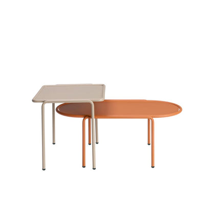 S•CAB Dress Code Oval Coffee Table paired with a matching square side table in a contemporary nesting table arrangement.