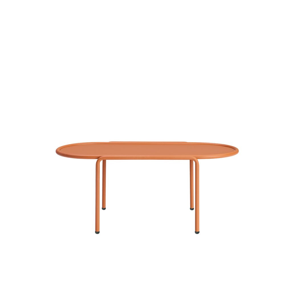 Front view of the S•CAB Dress Code Oval Coffee Table featuring a terracotta oval tabletop with a minimalist tubular metal frame.