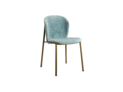 Front angled view of the Finn 2893 upholstered dining chair with light blue fabric upholstery and slim bronze metal legs.