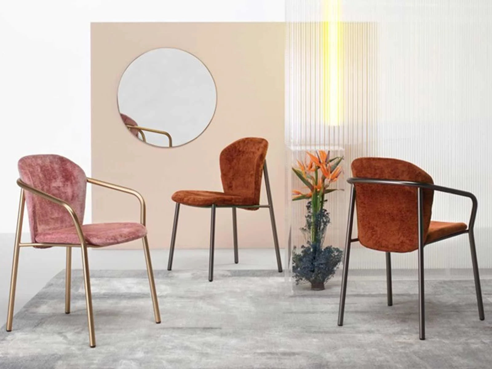 Finn 2893 upholstered dining chair collection in rust and pink fabric finishes displayed in a contemporary interior setting.