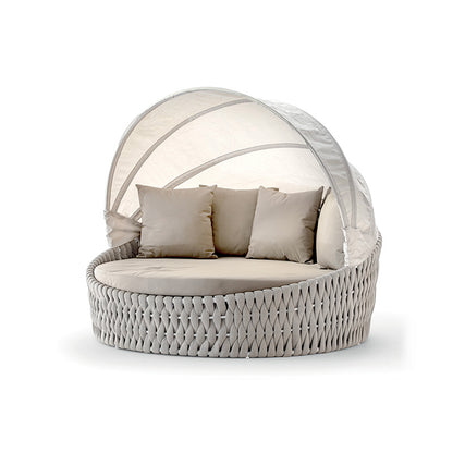 Luxury round outdoor daybed with canopy, rope weave base, beige waterproof cushions, modern garden furniture by Grattoni
