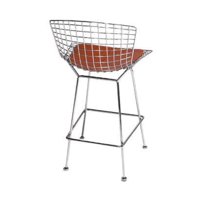 Harry Bertoia style wire bar stool with polished chrome steel wire frame, integrated footrest and premium tan leather seat pad, ideal for modern kitchen islands, breakfast bars and luxury commercial interiors.