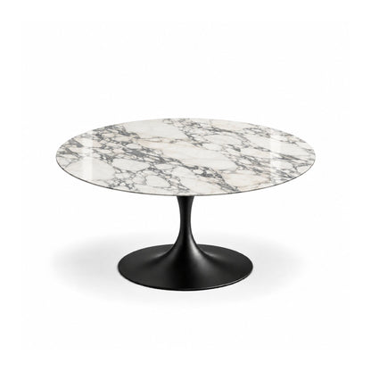 Imperia Statuario Tulip coffee table featuring a polished Statuario marble tabletop with dramatic grey veining and a glossy black tulip pedestal base, creating a refined statement piece for luxury modern, contemporary, Scandinavian, and mid-century living room interiors.