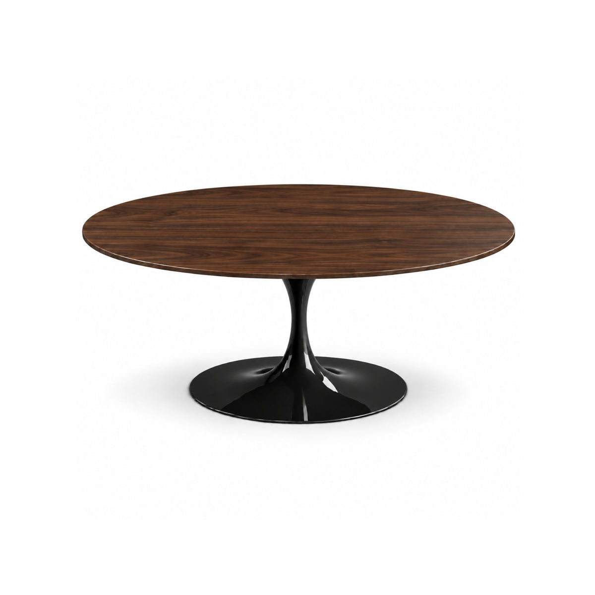 Italian oval walnut wood dining table with a glossy black tulip pedestal base on a white background.