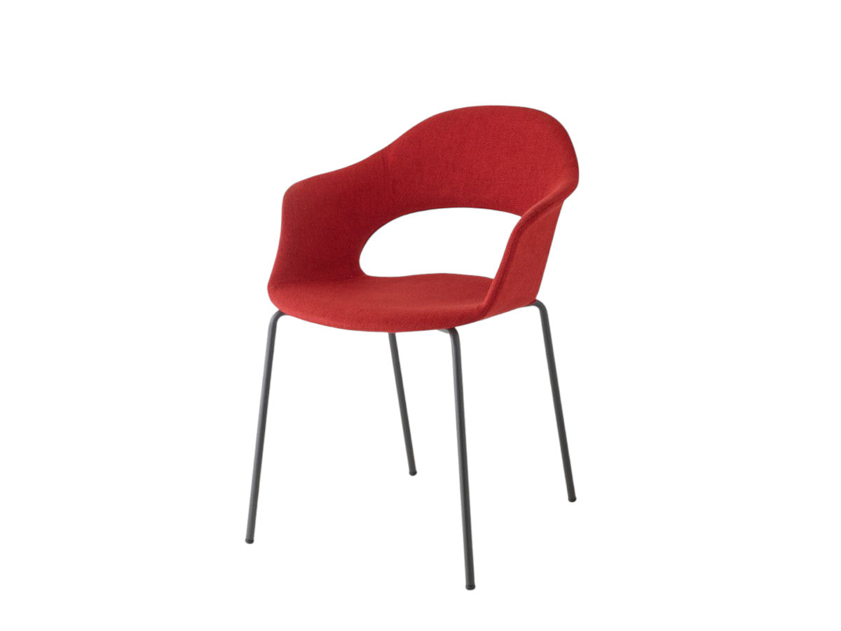Front view of the S•CAB Lady B Pop Chair with Armrests featuring a coral upholstered shell seat with integrated armrests and slim metal legs.