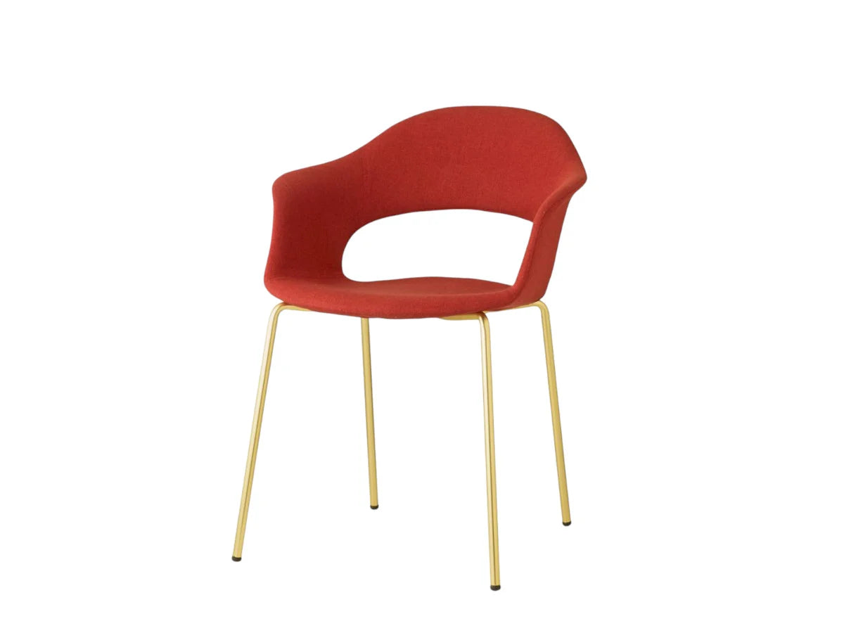 Front view of the S•CAB Lady B Pop Chair with Armrests featuring a red upholstered shell seat and elegant brass-finish metal legs.