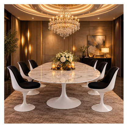 Large oval Tulip dining table with a white veined ceramic top and pedestal base, surrounded by white chairs with black seats in an elegant dining room