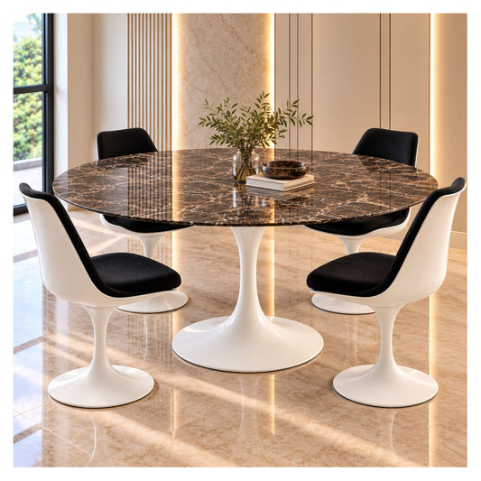 Large round dark marble Tulip dining table with a white pedestal base, styled with four white chairs with black seats in a bright modern dining room
