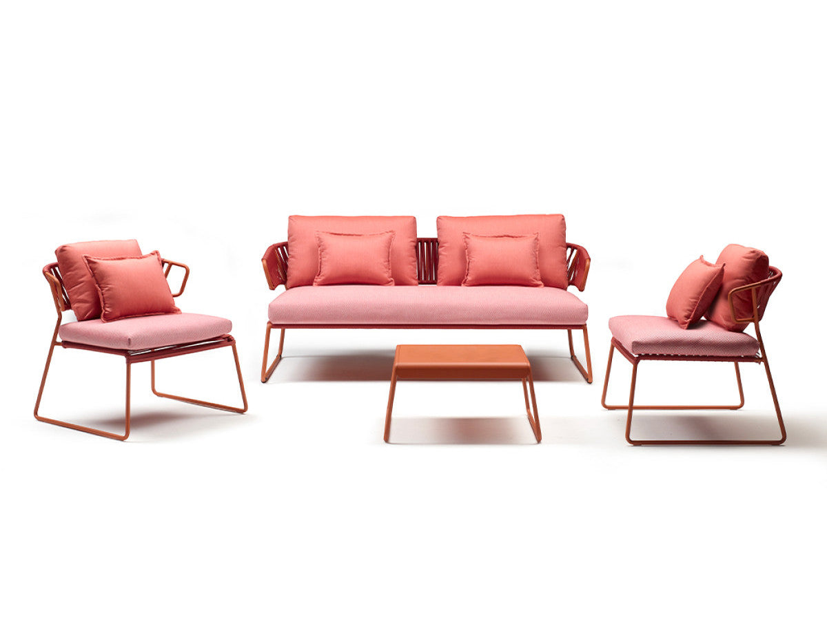 Lisa Club outdoor lounge set with a coral sofa, matching lounge chairs, and coffee table on a clean white background.
