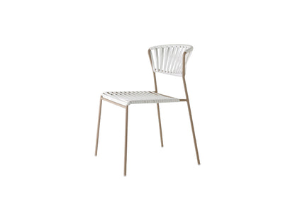 Front angled view of the Lisa Filò chair with a white woven rope seat and backrest on a slim taupe metal frame.