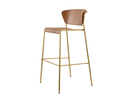 Front angled view of the Lisa Wood bar stool with a walnut plywood seat and backrest, slim brass metal frame, and integrated footrest.