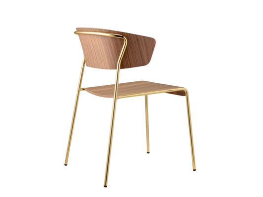 Rear angled view of the Lisa Wood walnut dining chair with a curved plywood backrest and slim brass metal frame.