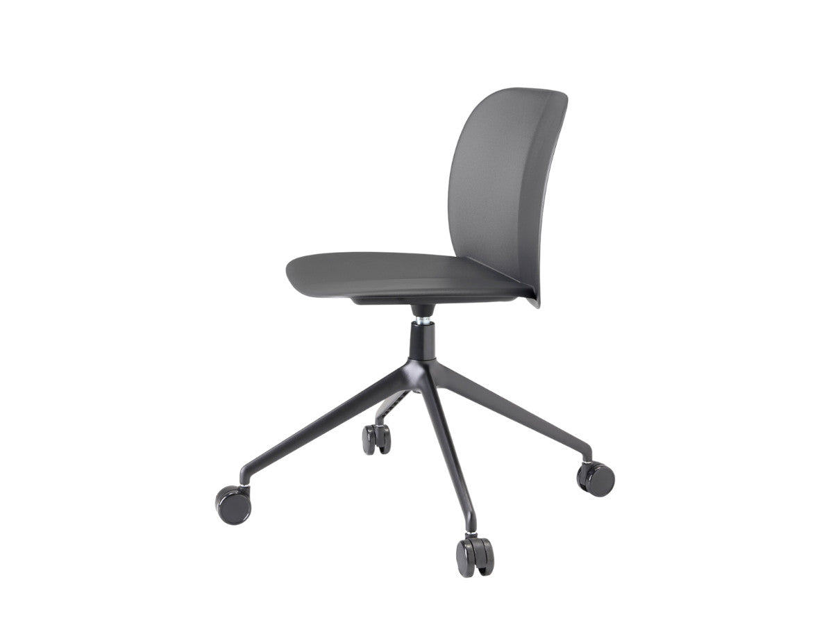 Side view of the S•CAB Mentha office chair with grey upholstered seat, black swivel base, and smooth-rolling castors.
