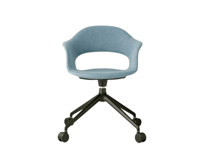 Front view of the Mentha Pop office chair with light blue upholstered shell seat, black swivel base, and castors.