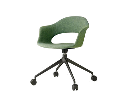 Front angled view of the Mentha Pop office chair with green upholstered shell seat, black swivel base, and smooth-rolling castors.