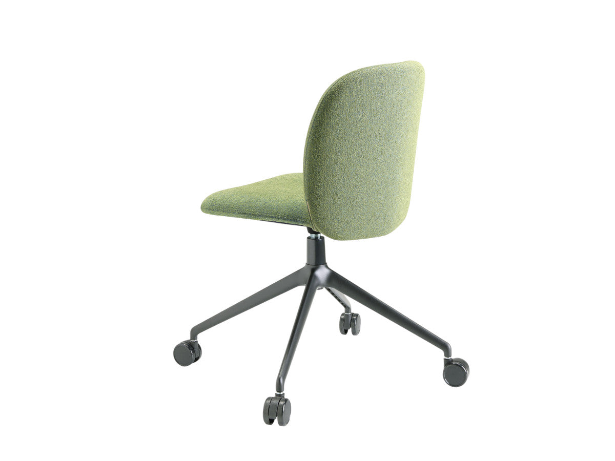 Rear angled view of the Mentha Pop green upholstered office chair with a curved backrest, black swivel base, and smooth-rolling castors.