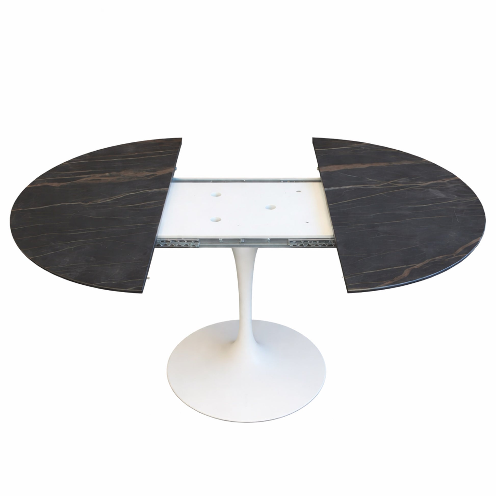 Oval extending tulip dining table with Noir Desir ceramic black top and white pedestal base, shown partially open with extension mechanism visible on a white background
