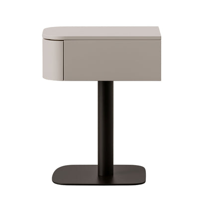 Small side table with a beige top and black base on a white background