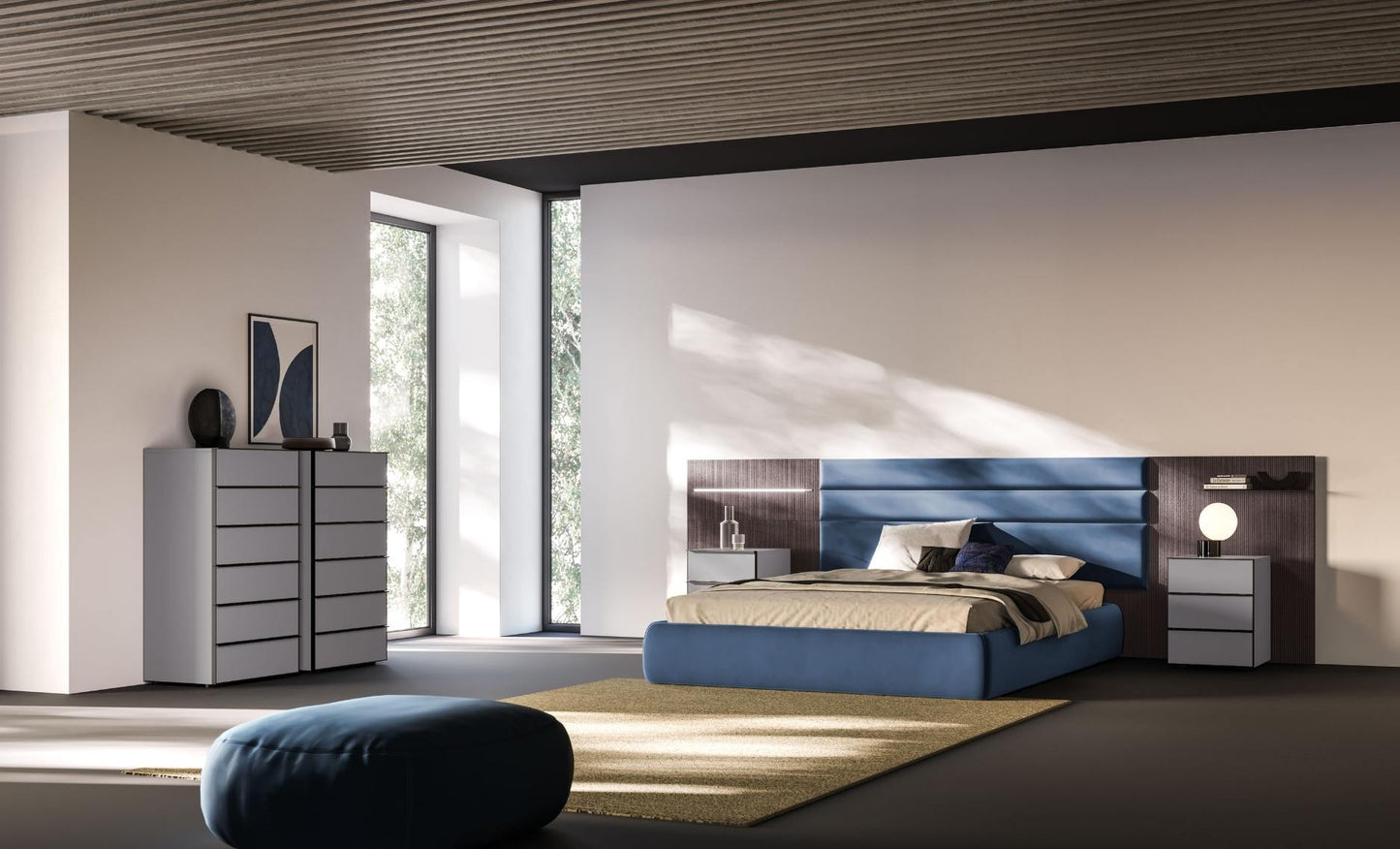 Modern bedroom with a blue bed, dresser, and nightstands.