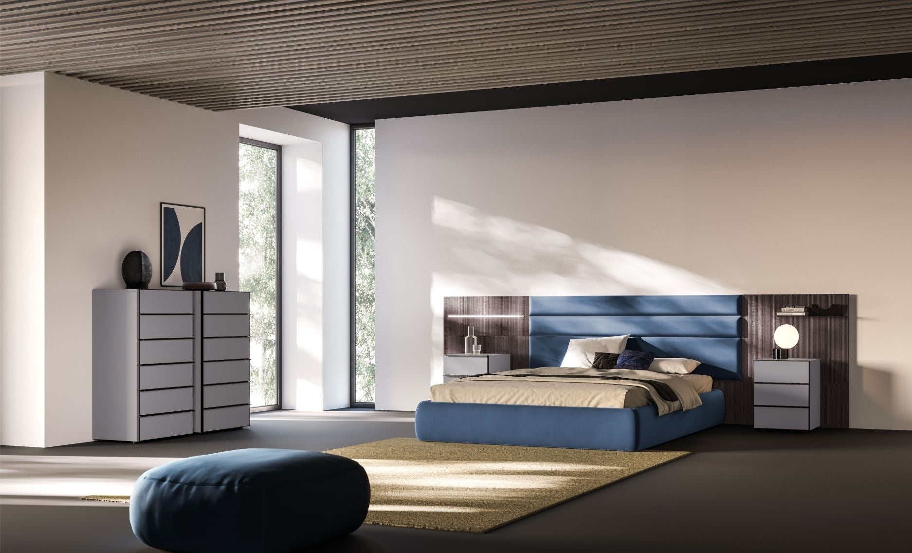 Modern bedroom with a blue bed, nightstands, and a dresser.