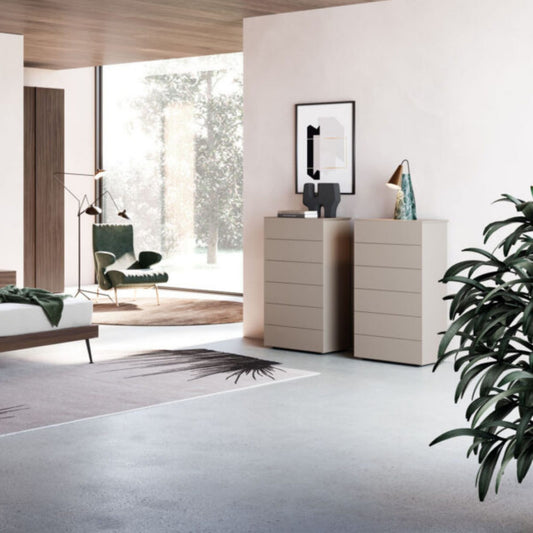 Modern interior design with a desk, chair, and decor elements.