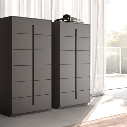 Two modern gray dressers with multiple drawers in a bright room.