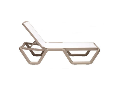 Side view of a white outdoor sun lounger with an adjustable backrest, breathable mesh surface, and geometric base.