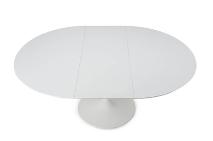 Extendable oval white tulip dining table with pedestal base shown open with central extension in a modern minimalist interior