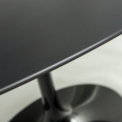 
Close-up of wood-effect tulip dining table top with smooth rounded edge and pedestal base detail in a modern interior setting