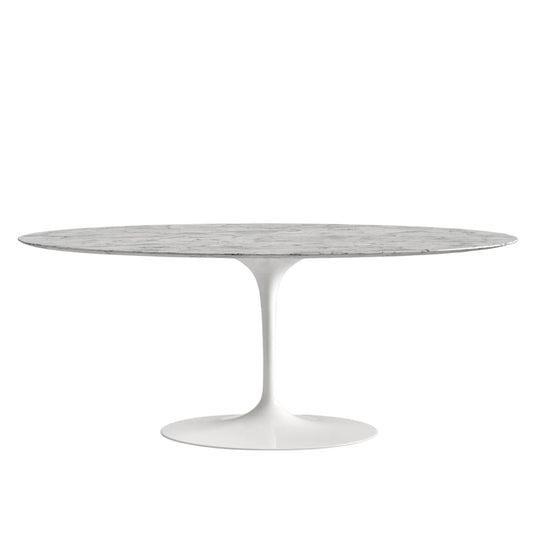 Round marble table with white base on a white background