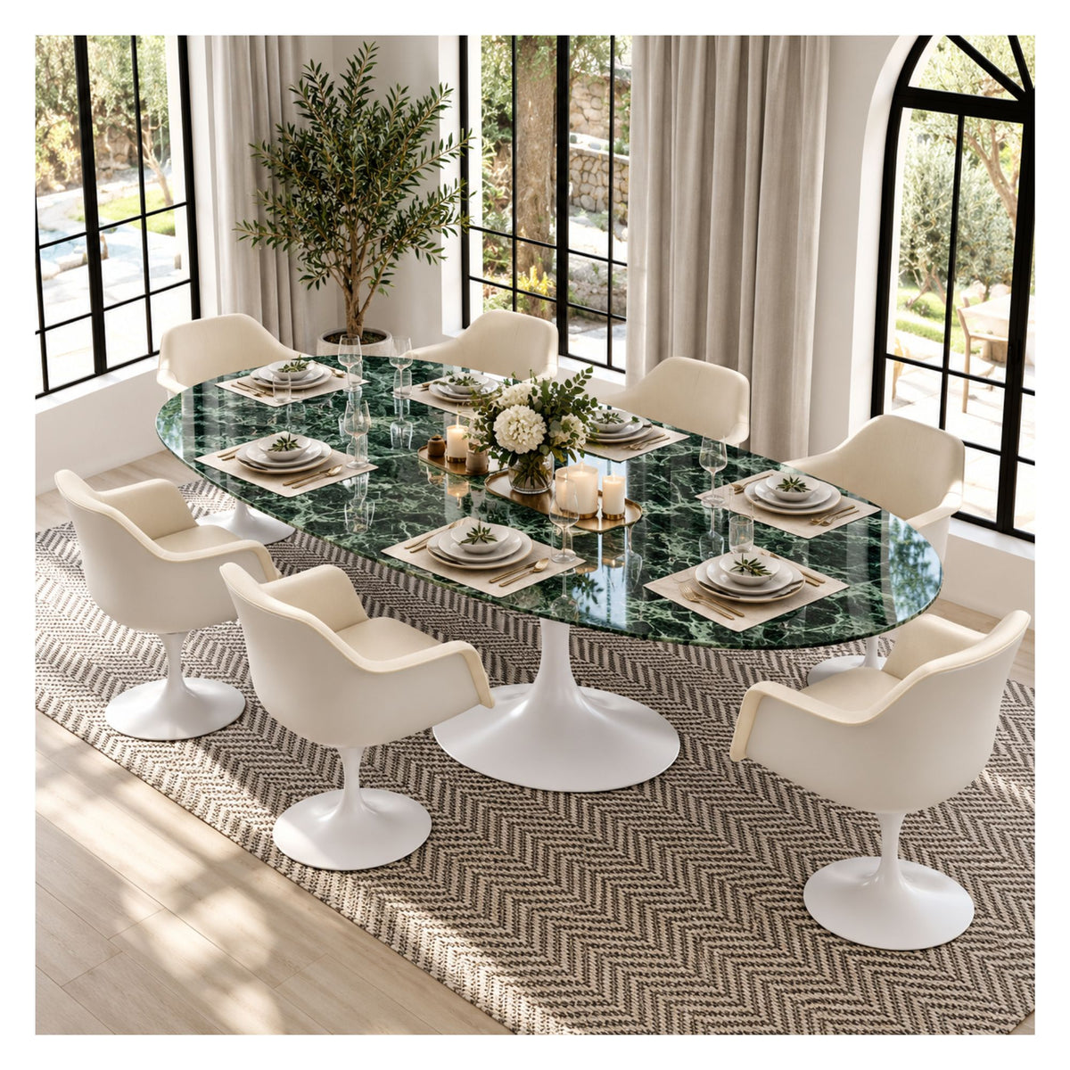 Large oval Tulip executive table with a glossy green marble top and white pedestal base, surrounded by cream upholstered chairs in a bright meeting room.