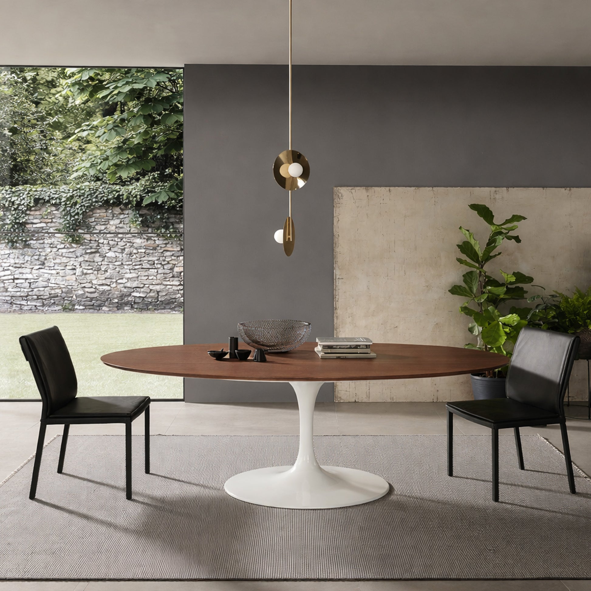 Oval tulip table Saarinen style with moka oak top in modern dining room