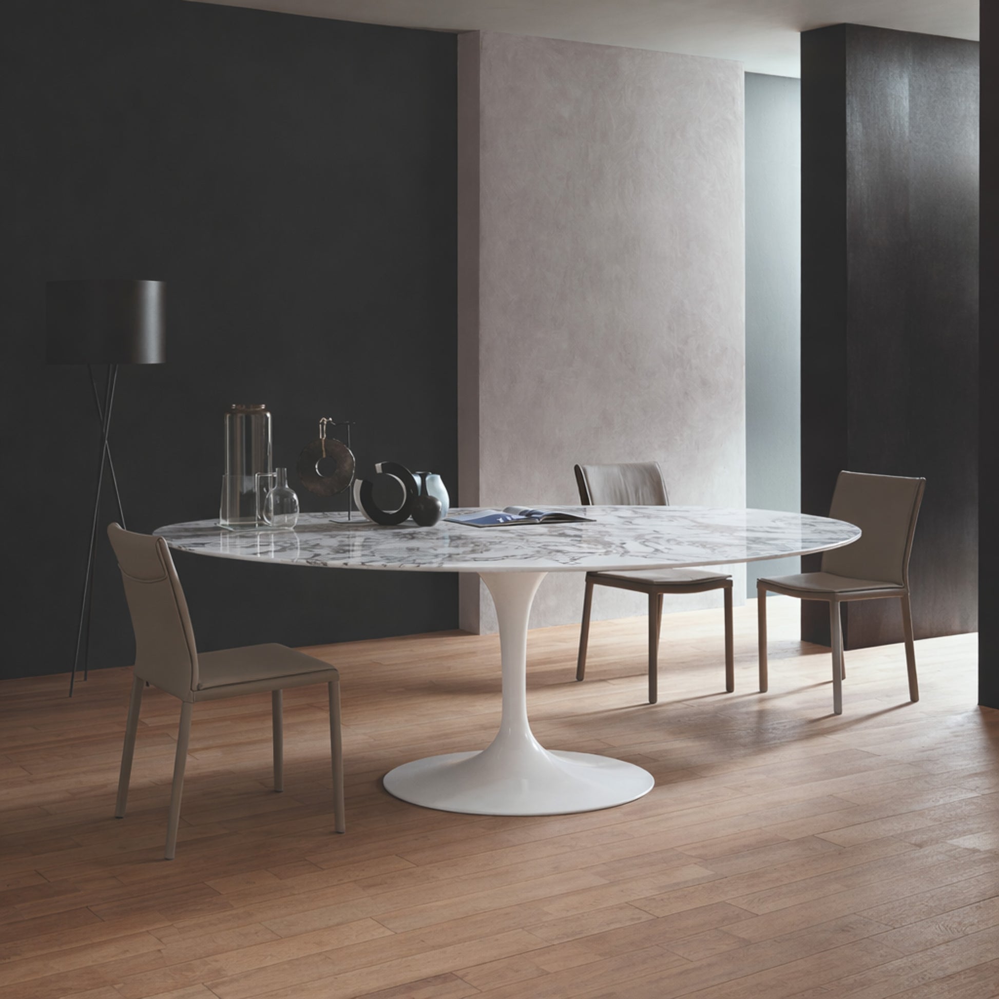 Oval tulip table Saarinen style with white marble top in modern dining room