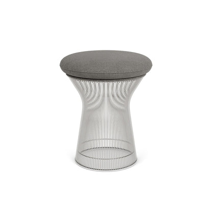 Platner-inspired upholstered stool featuring a polished stainless steel wire frame with a round grey fabric cushion.