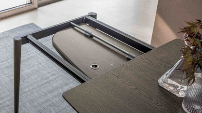 Internal book extension stored inside the Ribot Wood extendable dining table by Altacom