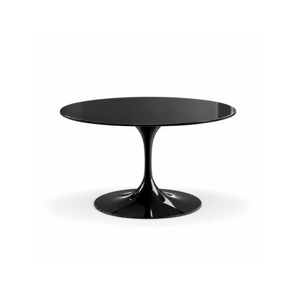 Round Tulip dining table with a scratch-resistant black liquid laminate tabletop and gloss black cast aluminium pedestal base, handcrafted in Italy for modern dining spaces.