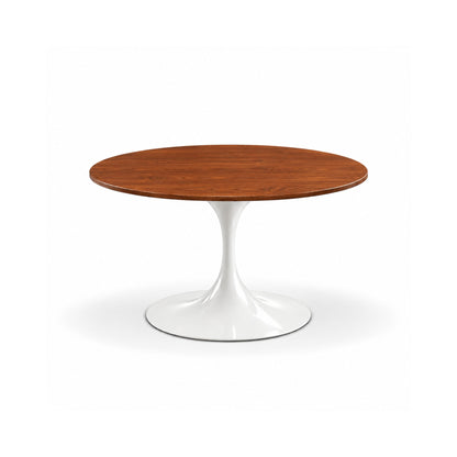 Round Tulip dining table with a chestnut solid oak tabletop and sculptural white pedestal base, handcrafted in Italy for contemporary dining spaces.
