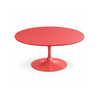 Round Tulip dining table with a coral red liquid laminate tabletop and matching coral red cast aluminium pedestal base, handcrafted in Italy for contemporary dining interiors.