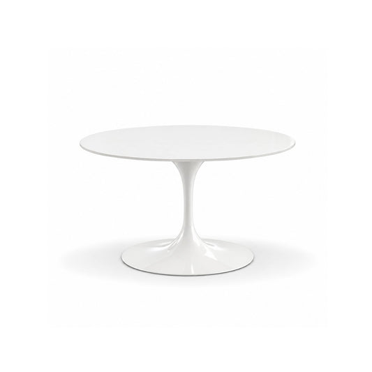 Round white tulip dining table with a white laminate top and sculptural white pedestal base, inspired by mid-century modern Italian design.