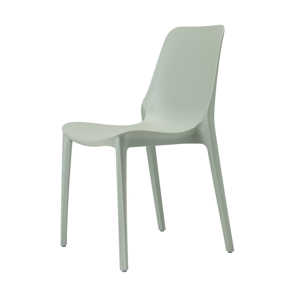 SCAB Hug chair in sage green shown from the side, featuring a sculpted recycled technopolymer shell and stackable design for indoor and outdoor dining spaces, Made in Italy