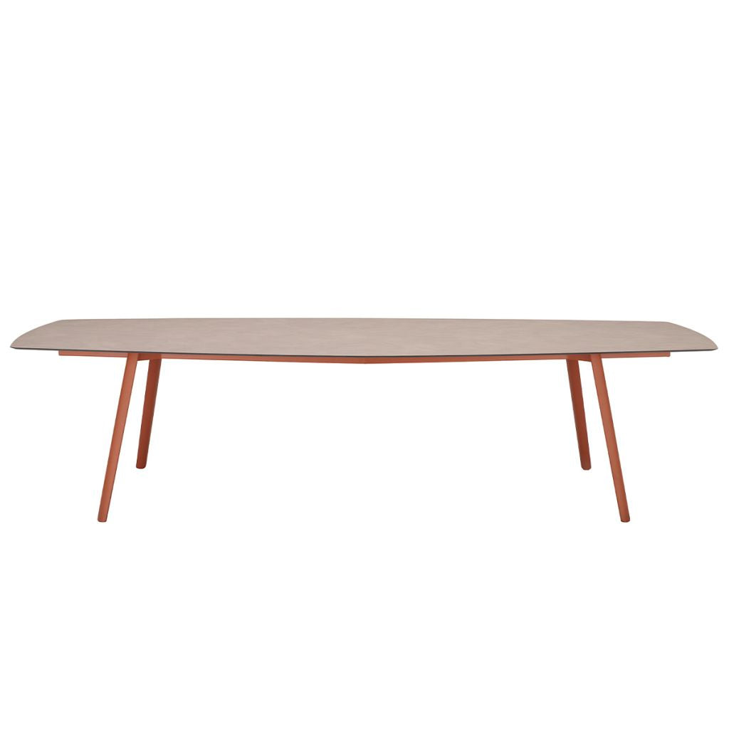 Front view of the S•CAB Squid Hexagonal Dining Table with a wood-effect hexagonal tabletop and terracotta angled metal legs.