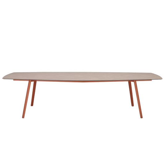 Front view of the S•CAB Squid Hexagonal Dining Table with a wood-effect hexagonal tabletop and terracotta angled metal legs.