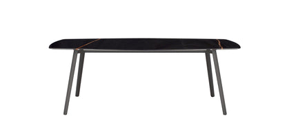 Front view of the S•CAB Squid M Marble Dining Table with a black marble-effect tabletop and dark grey angled metal legs.
