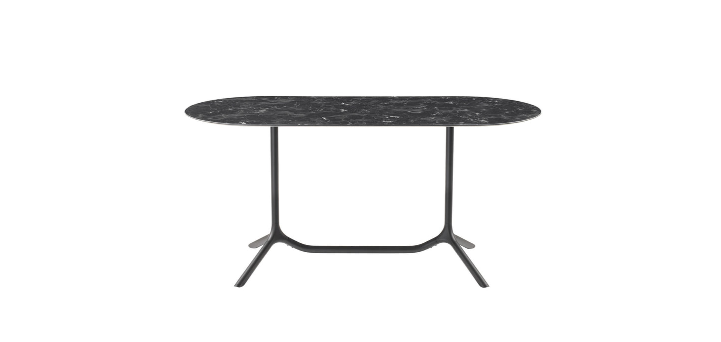 Front view of the S•CAB Tripé Double Dining Table Base with a black marble-effect oval tabletop and double pedestal metal base.