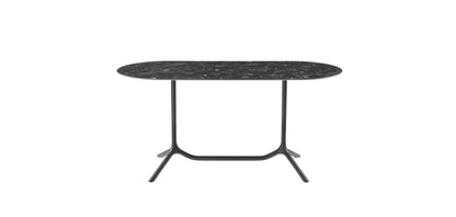 Front view of the S•CAB Tripé Double Dining Table Base with a black marble-effect oval tabletop and double pedestal metal base.