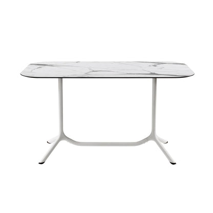 Front view of the S•CAB Tripé Double Dining Table Base with a white marble-effect rectangular tabletop and white double pedestal metal base.
