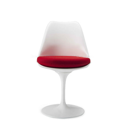 Tulip pedestal dining chair with a white moulded shell, white cast aluminium base and red upholstered seat cushion, inspired by Eero Saarinen's iconic mid-century modern design.
